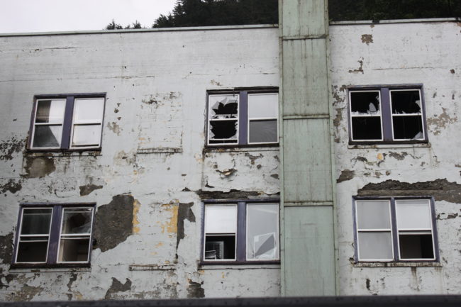 Gastineau Apartments still have unboarded, broken windows. (Photo by Lisa Phu/KTOO)