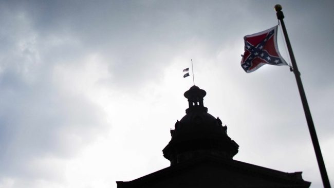 The Confederate battle flag flies at the South Carolina State House in Columbia late last month. The state's Senate voted Monday to remove the flag; after one more vote on the bill, it will head to the House. Jim Watson/AFP/Getty Images