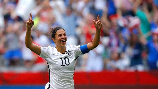 To the delight of American fans, Carli Lloyd of the United States scored a hat trick in the first 15 minutes of the FIFA Women's World Cup Final against Japan on Sunday. Kevin C. Cox/Getty Images