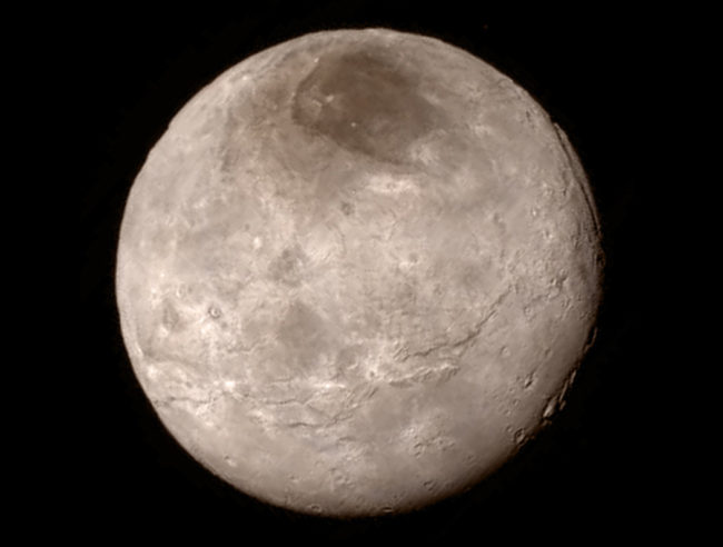 New details of Pluto's largest moon, Charon, are revealed in this image from New Horizons' Long Range Reconnaissance Imager. NASA