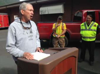 National Weather Service Meteorologist Joel Curtis (left) spoke with reporters Friday, along with DOT geologist Mitch McDonald and Deputy Fire Chief Al Stevens. (Photo by Robert Woolsey/KCAW)