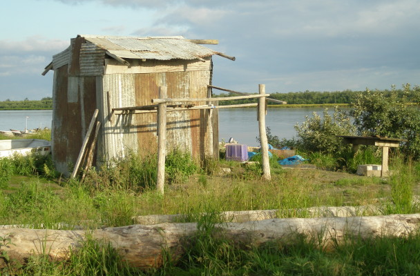 A smokehouse and fishrack in Emmonak. (Photo courtesy of Alaska Department of Fish and Game)