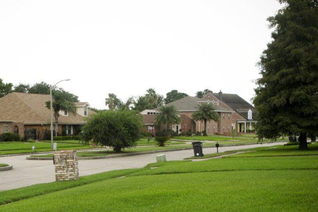 Large homes and lush lawns are common in Lake Forest Estates, a subdivision in New Orleans East. After Katrina, 6-foot-deep flood waters devastated the region. Cheryl Corley/NPR