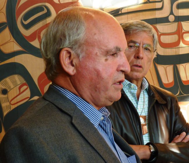 B.C. Minister of Mines Bill Bennett, left, discusses his trip up the Taku River with Lt. Gov. Byron Mallott, right, in the Walter Soboleff Center lobby Aug. 24 in Juneau. (Photo by Ed Schoenfeld/CoastAlaska News)