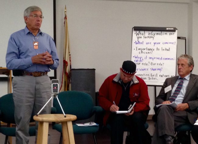 Lt. Gov. Byron Mallott speaks at a Wednesday tribal meeting on transboundary mines in Juneau. United Tribal Transboundary Mining Work Group Co-Chair Rob Sanderson Jr., center, and Fish and Game Commissioner Sam Cotten listen. (Photo by Ed Schoenfeld/CoastAlaska News)