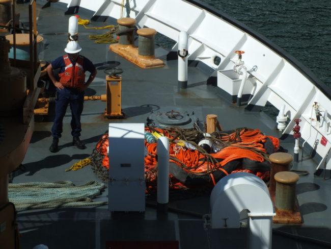 The Emergency Towing System consists of a messenger line, 10 inch main tow line, and a set of buoys in a package that can lowered to any vessel by crane or helicopter. (Photo by Matt Miller/KTOO)