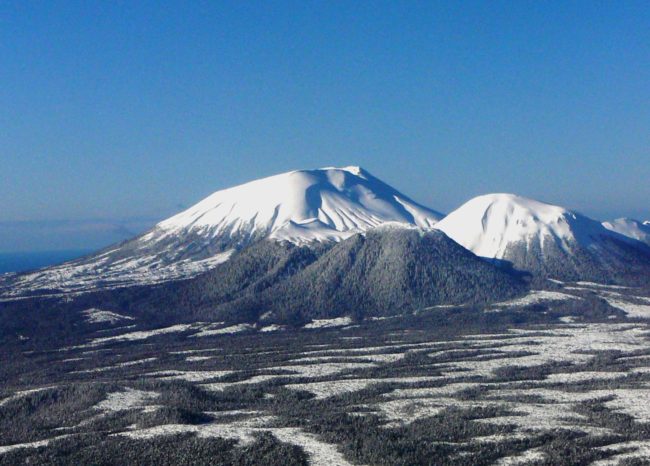 Baranof island's Mount Edgecumbe volcanic cone  rises 3,200 feet from the ocean near Sitka. Click here to watch a video flyover of the volcanic field. (Ed Schoenfeld/CoastAlaska News)