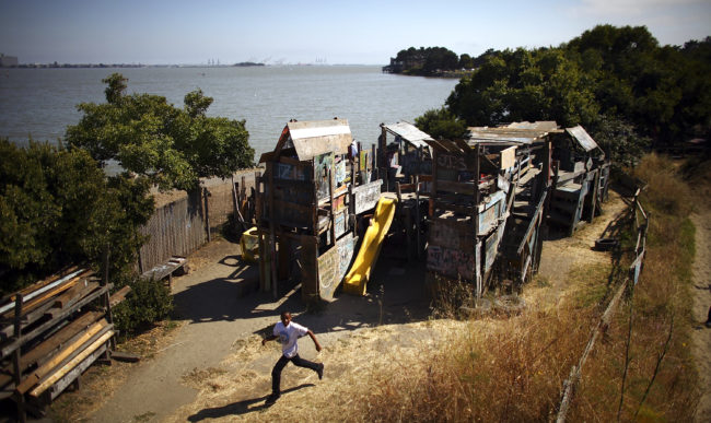 The park is a half-acre of dirt and quirky chaos hugging the Berkeley Marina on the San Francisco Bay. Children can paint, hammer and build with a minimum of adult intervention. David Gilkey/NPR