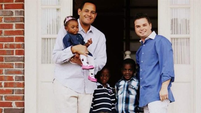 Casanova and Daniel Nurse stand with children Ava Rose, 2, and Neijal and Cameron, both 4, whom they adopted from Florida’s foster care system. Some states still have barriers for married gay couples looking to adopt from foster care. (Photo courtesy of Pew Charitable Trusts)