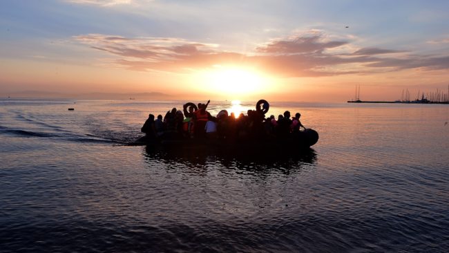 Syrian migrants arrive on an overcrowded dinghy to the coast of the southeastern Greek island of Kos from Turkey, on Saturday. A ferry boat has been sent by the Greek government to the resort of Kos to speed up the registration process of hundreds of Syrian refugees. Louisa Gouliamaki /AFP/Getty Images