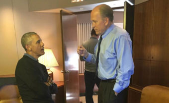Gov. Bill Walker talks with President Barack Obama on Air Force one. The president is visiting Alaska to observe the effects of climate change. (Photo courtesy of Gov. Bill Walker's office)