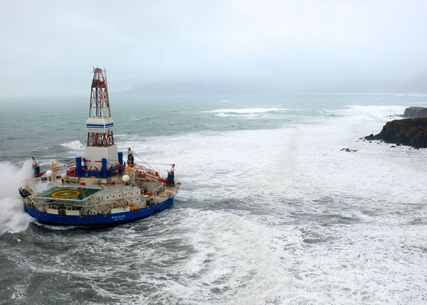 The Kulluk is an Arctic drill rig owned by Royal Dutch Shell. In 2012, the rig ran aground off Sitkalidak Island near Kodiak Island. The highly publicized incident was used by drilling opponents as an example of Shell's lack of qualifications to drill in the Arctic. (Photo by Petty Officer 1st Class Sara Francis/U.S. Coast Guard)