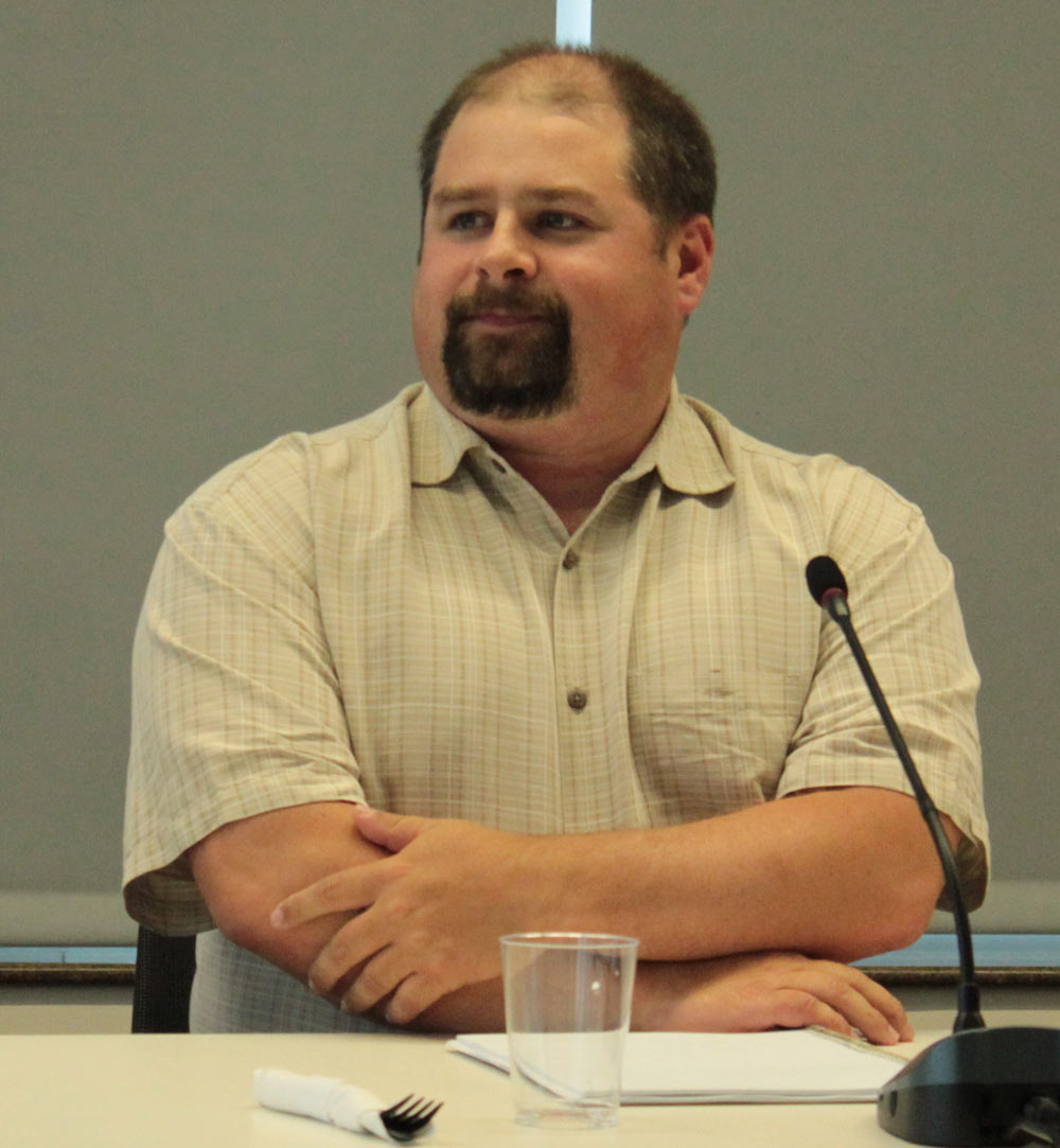 Josh Keaton at the school board candidate forum held by the Juneau Chamber of Commerce (Photo by David Purdy/KTOO)