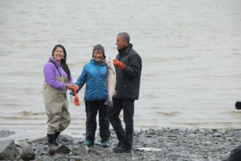 President Obama picked up a silver on the beach in Dillingham. (Photo by Hannah Colton/KDLG)