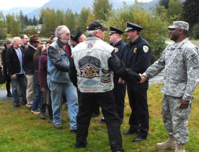 Juneau residents get to know first responders and service members during a short break in the obseverance. (Photo by Matt Miller/KTOO)