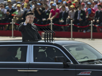 Xi Jinping presided over a Beijing military parade marking the 70th anniversary of the end of World War II. To some observers, this showed Xi in firm political and military control. On the economic side, though, the signals are more mixed. Kevin Frayer/Getty Images