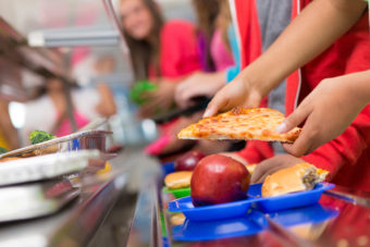 Longer lines in the cafeteria and shorter lunch periods mean many public school students get just 15 minutes to eat. Yet researchers say when kids get less than 20 minutes for lunch, they eat less of everything on their tray. iStockphoto