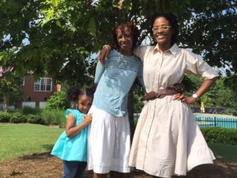 Marilyn Hack (middle) and her daughters Terez and Maliha have lived at the Villages of East Lake for 15 years. Hack was attracted by the safety and affordability. Elly Yu/Courtesy of Elly Yu