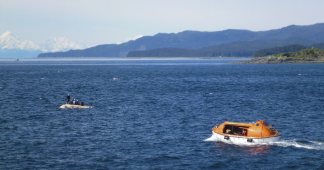 The LeConte state ferry launches a lifeboat to rescue six men from an overturned skiff. (Photo courtesy Janet Neilson)