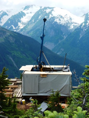 A KSM drill rig perches above a deep valley about 80 miles east of Wrangell. (Photo by Ed Schoenfeld/CoastAlaska News)