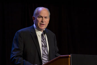 Gov. Bill Walker addresses the 49th annual Alaska Federation of Natives conference in Anchorage. (Photo by Mikko Wilson/KTOO)
