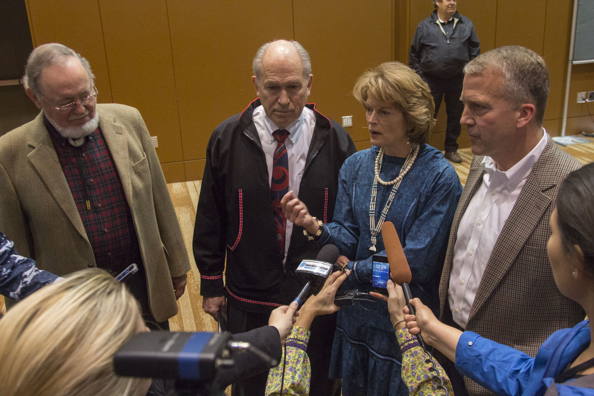 Alaska's congressional delegation and governor gather with press after the Department of the Interior's surprise announcement of the cancellation of off-shore drilling leases. (Photo by Mikko Wilson/KTOO)