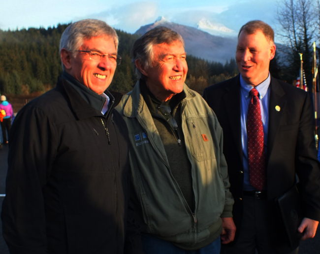 Lt. Gov. Byron Mallott (from left to right), Roy Peratrovich Jr., and Alaska Department of Transportation and Public Facilities Commissioner Marc Luiken pause for pictures before Saturday's ribbon cutting for the new Brotherhood Bridge. (Photo by Matt Miller/KTOO)