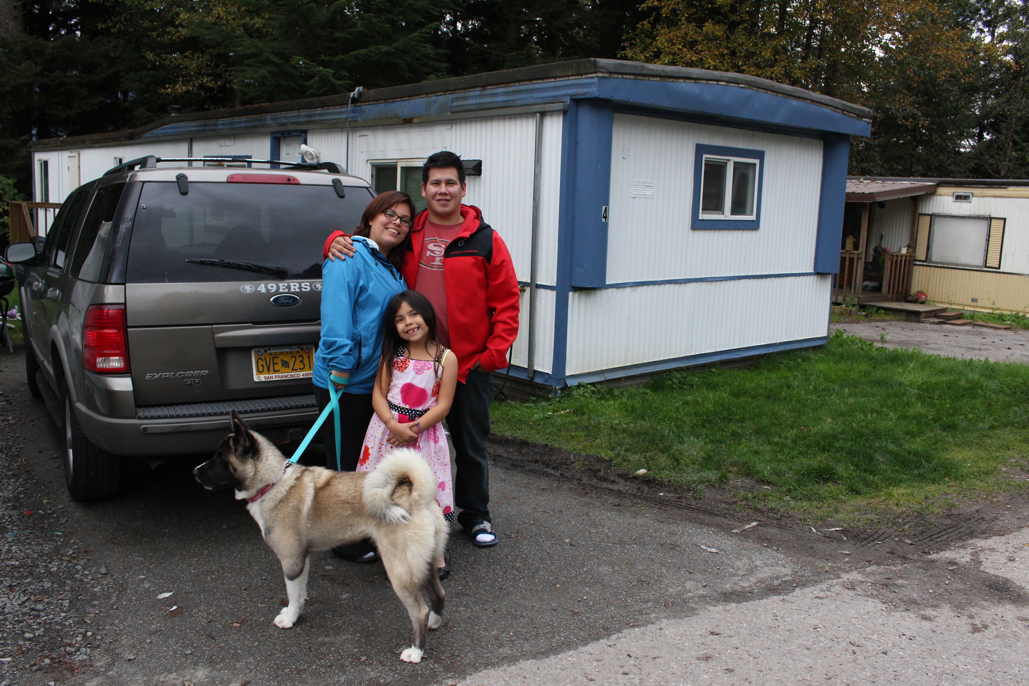 James Refeurzo and his family outside their family home. (Photo by Elizabeth Jenkins/KTOO) 