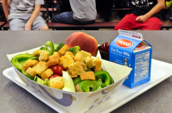 While schools are spending more on local food, it still makes up only a small portion of the average school meal. Here, a chicken salad at the cafeteria at Draper Middle School in Rotterdam, N.Y., in 2012. Hans Pennink/AP