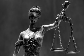 Blind Lady Justice with scales
