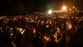 Hundreds of people gathered for a vigil in Roseburg, Ore., Thursday night, after 10 people died and seven others were wounded in a shooting at the local community college. Josh Edelson/AFP/Getty Images