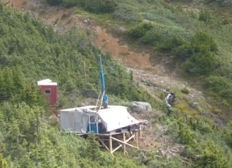 A drilling rig perches on the edge of a valley where Seabridge Gold’s KSM mine project is under exploration. Summer drilling expanded the boundaries of a rich deposit that could be more profitable than earlier discoveries. (Photo by Ed Schoenfeld/CoastAlaska News)