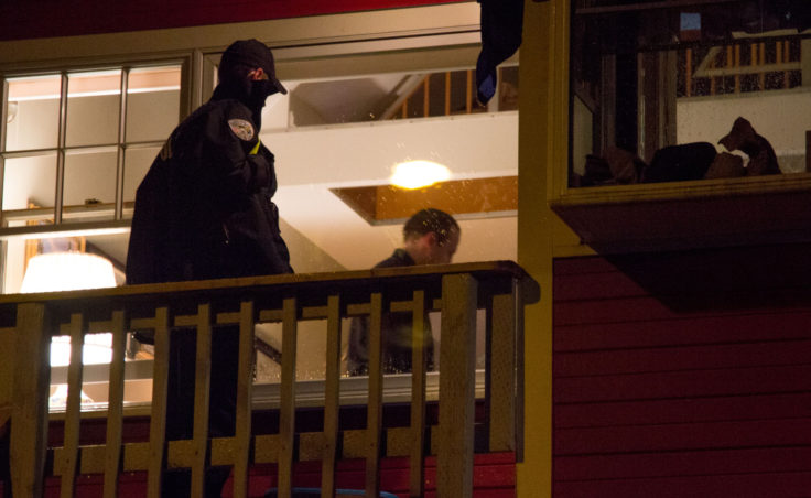 Juneau Police investigate the house of Juneau Mayor Greg Fisk on the evening of Monday November 30th. Photo by: Mikko Wilson / KTOO