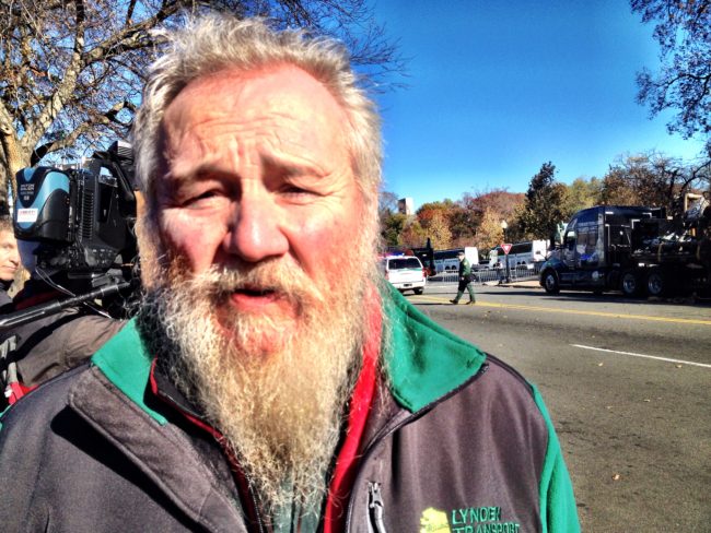 John Schank, the Fairbanks trucker who brought the tree, looks uncannily like Santa Claus. (Photo by Liz Ruskin/APRN)