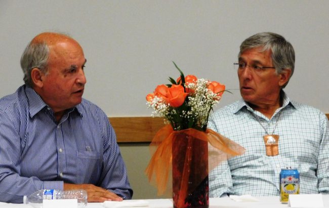 British Columbia Mines Minister Bill Bennett, left, and Alaska Lt. Gov. Byron Mallott talk at a dinner at Juneau's Walter Soboleff Center in August. (Photo courtesy governor's office)