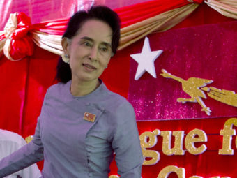 Myanmar's opposition leader Aung San Suu Kyi says she will be "above the president" if her party wins Sunday's election. In a constitutional clause that appears directed at her, a person can't become president if he or she is married to a foreign national or has children who are foreign nationals. Suu Kyi's late husband was British, as are their two sons. Mark Baker/AP