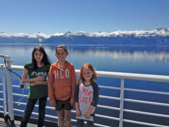 Children pose during an Alaska Marine Highway trip in Southeast Alaska. New rules for children traveling along remain on hold, officials say. (Photo courtesy AMHS)