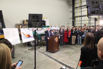 Gov. Bill Walker presented his budget plan in an event at the Lynden Hangar on Dec. 9, 2015. (Photo by Rachel Waldholz/APRN)