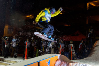 42 - Christian, soars over the box at the Downtown Rail Jam Dec. 19th. (Photo by Mikko Wilson/KTOO)