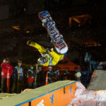 42 - Christian, flips inverted over the box at the Downtown Rail Jam Dec. 19th. (Photo by Mikko Wilson/KTOO)