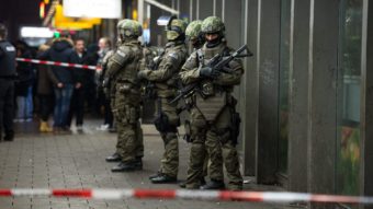 Armed German police on duty at the main railway station in central Munich on New Year's Eve. Sven Hoppe/EPA