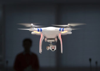 Chinese brand DJI Technology Co. has become the leading supplier in the commercial drone market. The Phantom 2 Vision+ drone pictured functions by remote control. Kin Cheung/AP