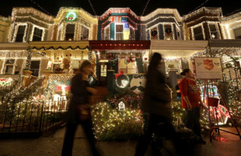 Onlookers come to admire the self-proclaimed "Miracle on 34th Street" in the Baltimore neighborhood of Hampden. But not every country has as much electricity as America does. Patrick Semansky/AP