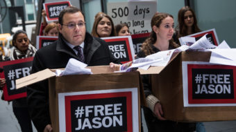 Ali Rezaian, brother of Washington Post journalist Jason Rezaian — who has now been imprisoned in Iran for 500 days — brings a petition to the Iranian Mission to the United Nations calling for his brother's immediate release. Andrew Burton/Getty Images