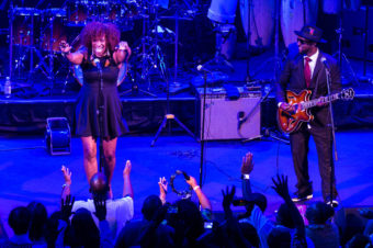 Singer Michelle Blackwell is helping lead the effort to enfranchise teenagers in the nation's capital. She and guitarist Frank "Scooby" Marshall of the The Chuck Brown All-Star Go-Go Band play a concert at Washington, D.C.'s Howard Theatre. John Shore