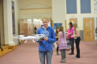 Hannah Moody pilots a drone at Point Higgins Elementary. (Photo by Ruth Eddy/KRBD)