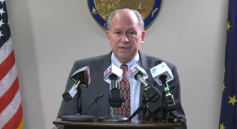 Gov. Bill Walker speaks Jan 5 at a press conference about new restrictions on state employee hiring and travel. (Screenshot)