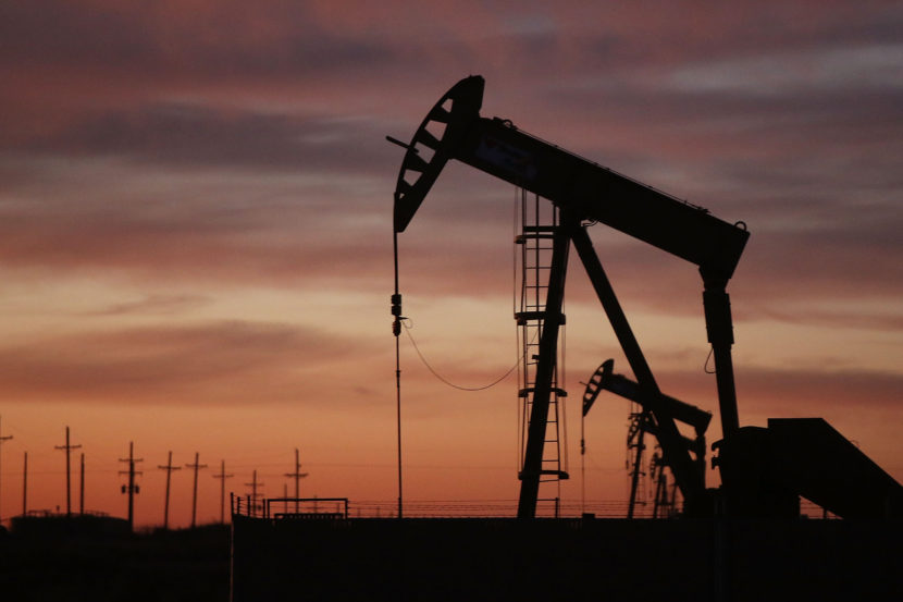 An oil pumpjack works at dawn Jan. 20 in the oil town of Andrews, Texas. (Spencer Platt/Getty Images)