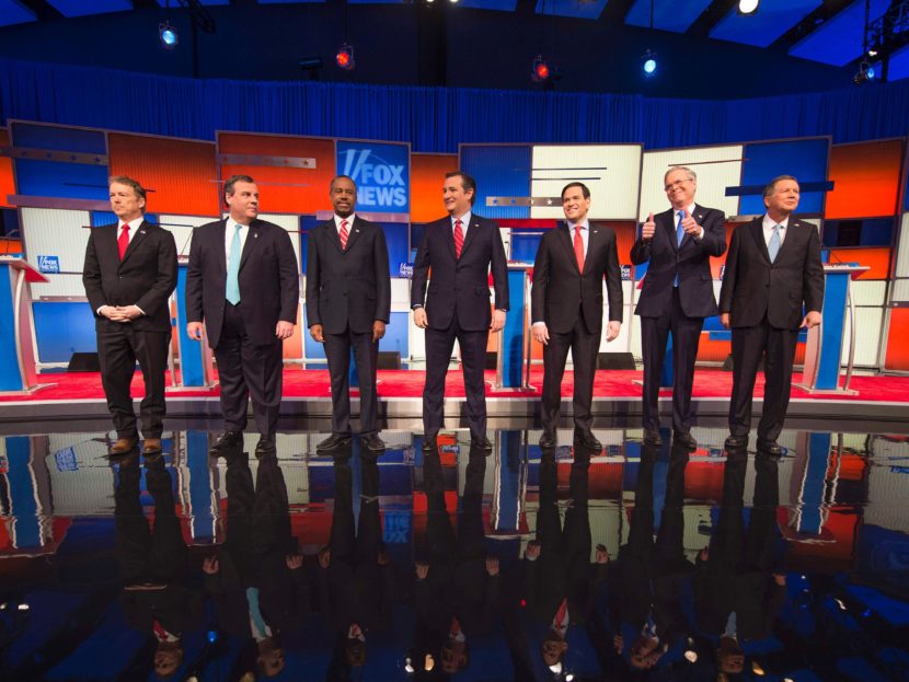Republican Presidential candidates arrive for the final Republican Presidential debate before the Iowa caucus in Des Moines, Iowa on Thursday. (Jim Watson/AFP/Getty Images)