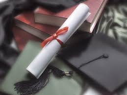 Diploma, graduation cap and books. (Public Domain photo)